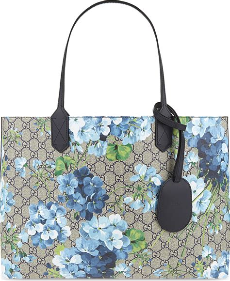 gucci gg blooms reversible tote|Gucci blooms key pouch.